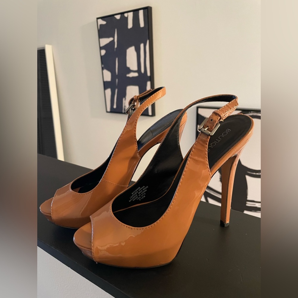 Mustard colored peep toe heels.